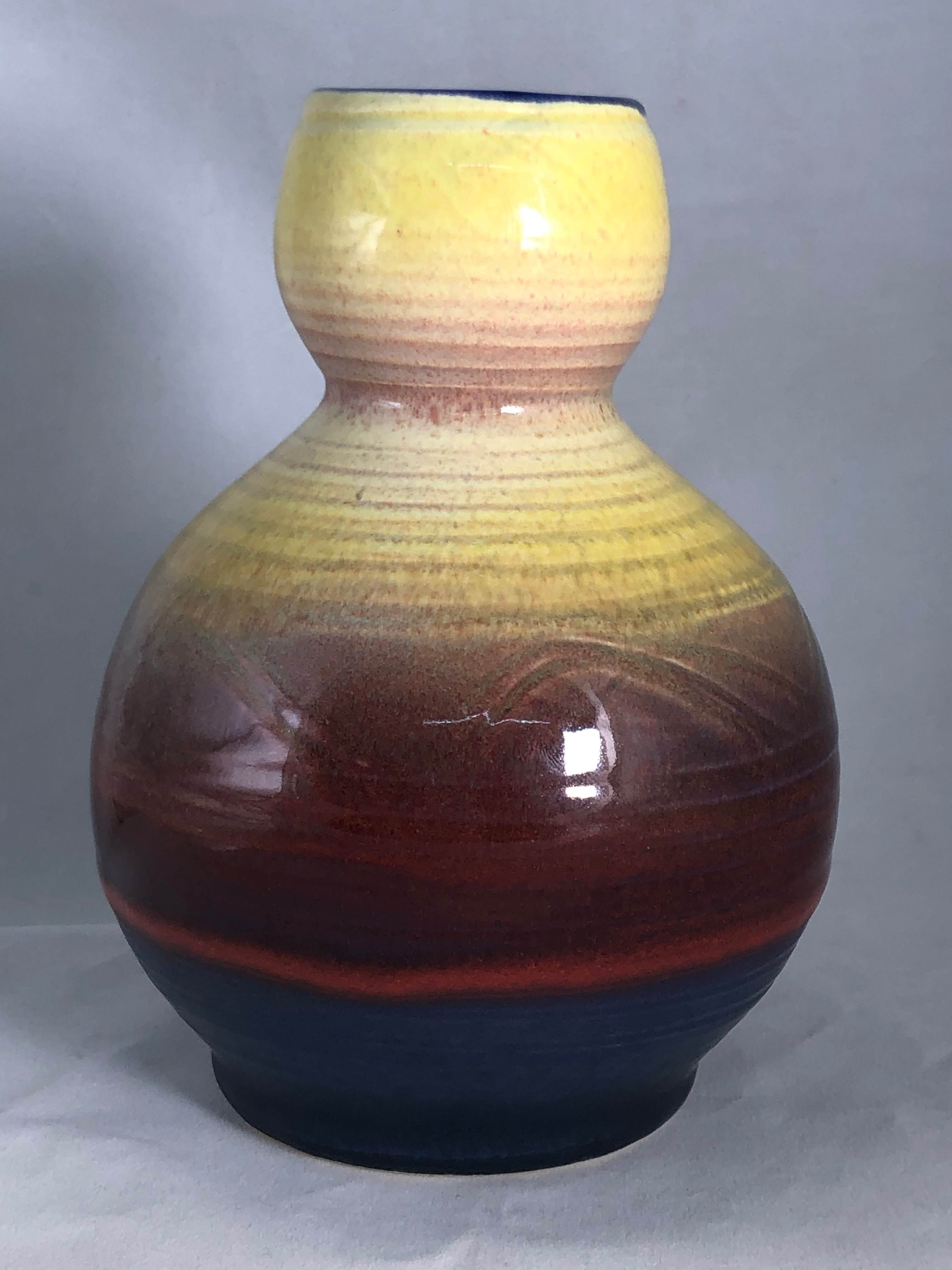 Small vase in yellow, red and cobalt