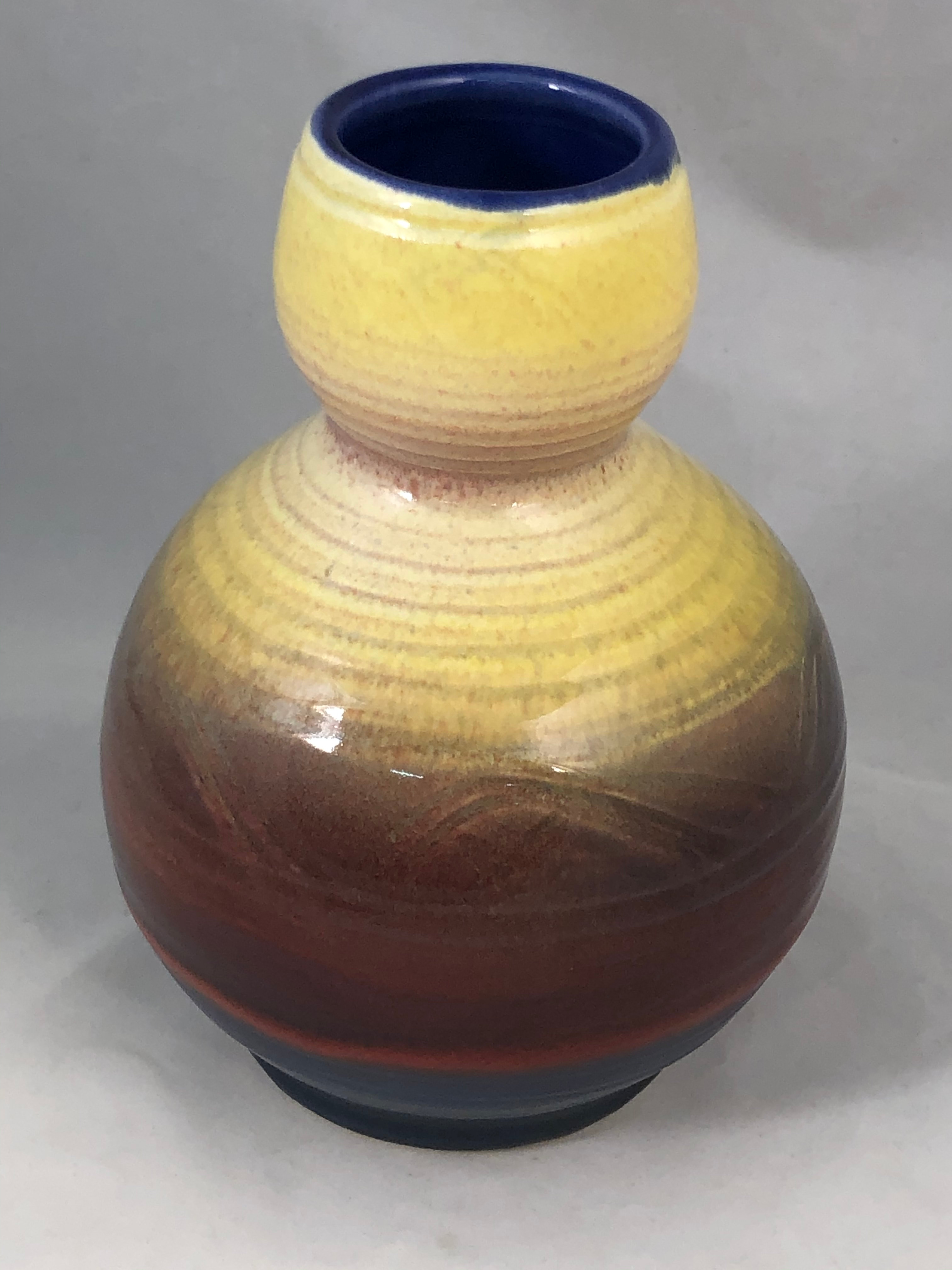 Small vase in yellow, red and cobalt